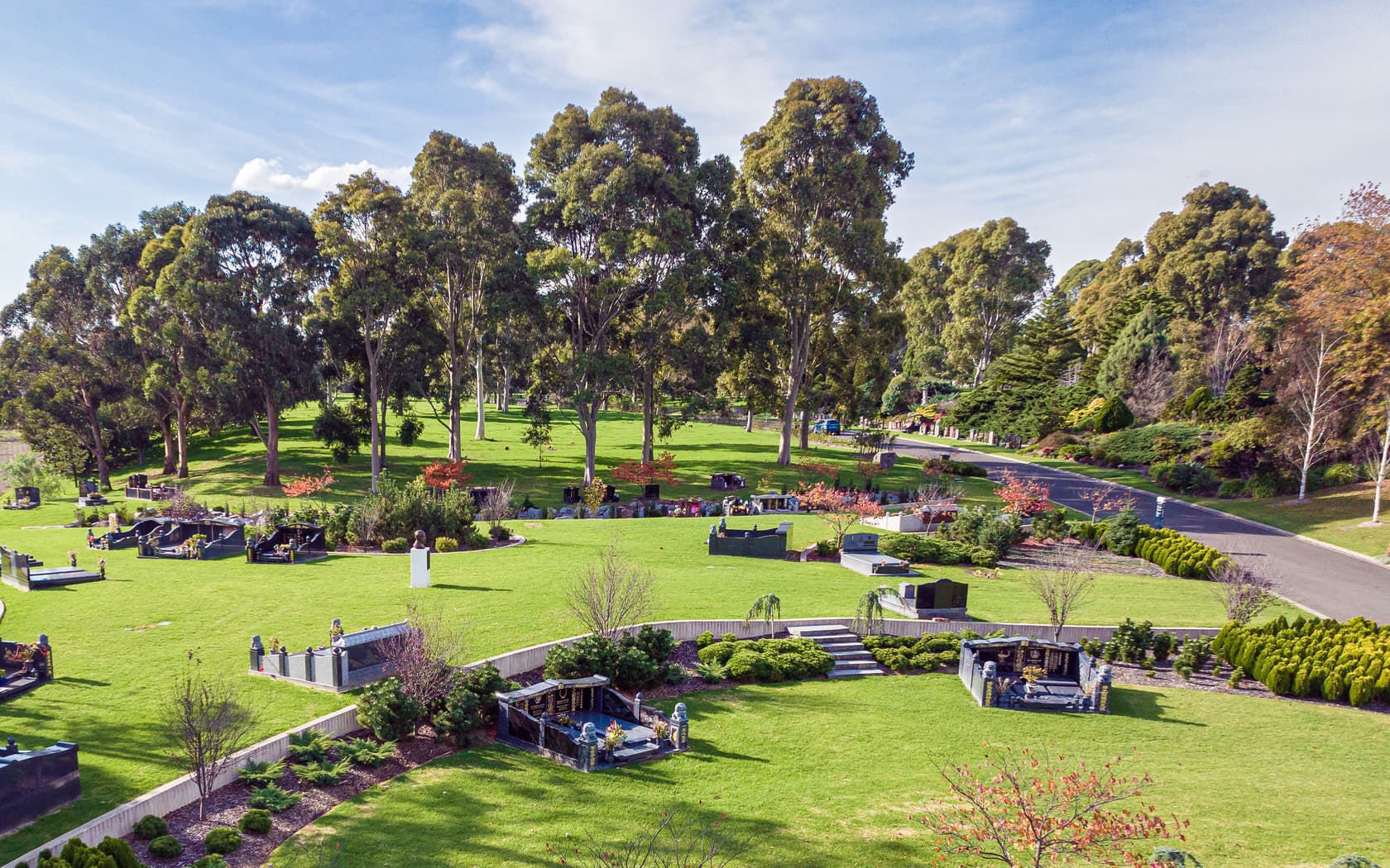 Serene bird's eye view of monumental graves at Lotus Garden memorial area at Springvale Botanical Cemetery